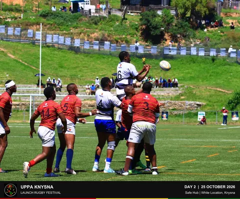 A player rises to receive the ball at a lineout.